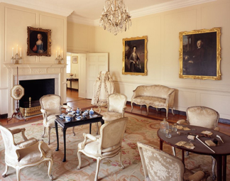Portraits of Charles and Margaret Carroll hang in parlor amid 1770s Louis XV parlor set acquired through an heir. Photo: Photo by Dan Meyers