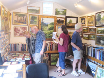Visitors viewing work during the Saugerties Art Tour at Raymond J Steiner's Studio
